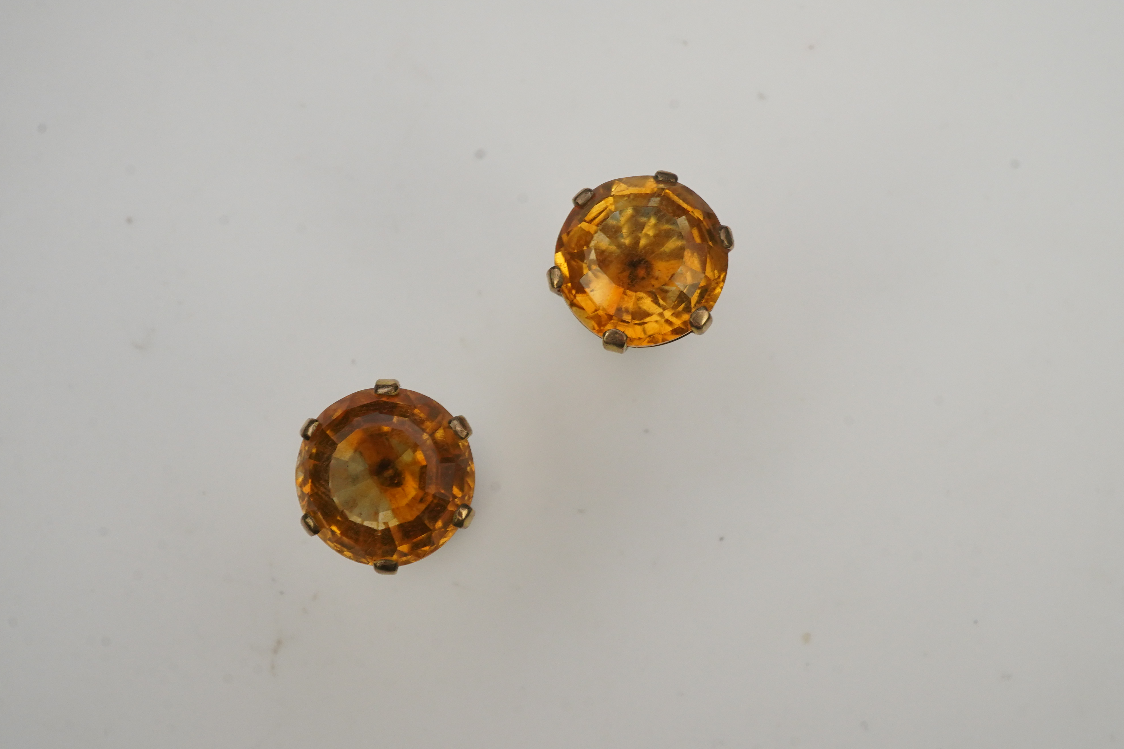 A pair of citrine ear studs